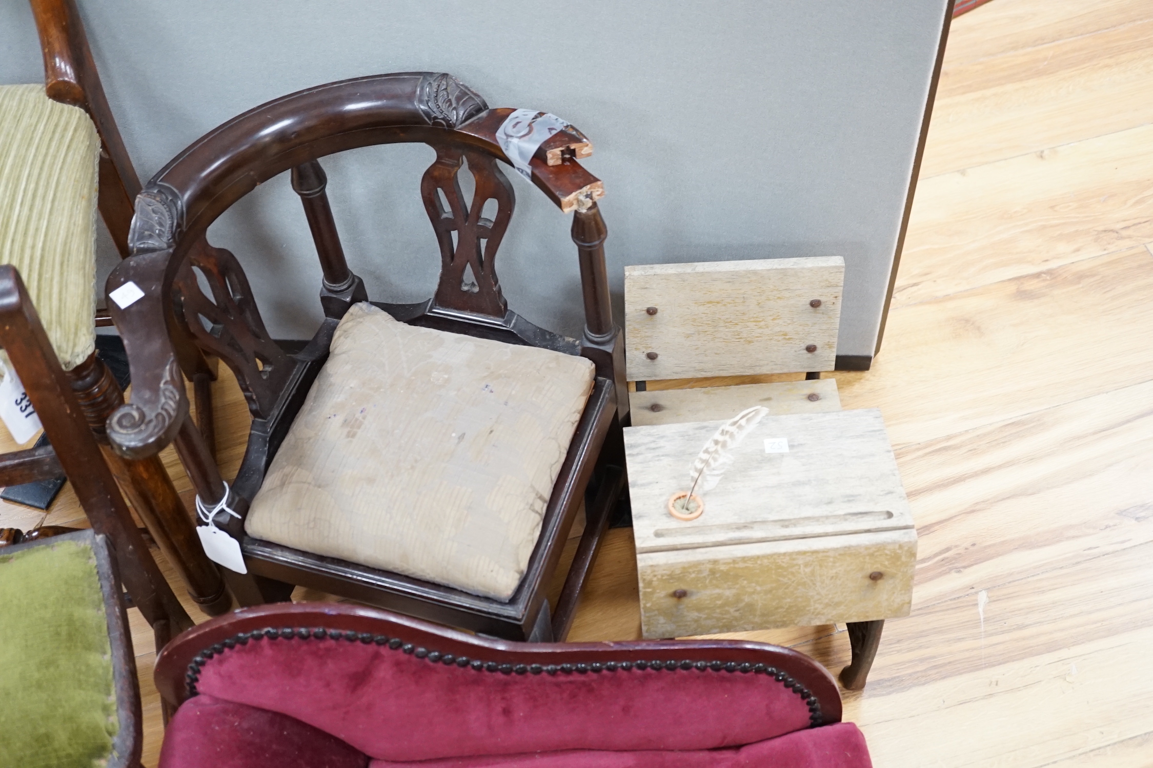 A tall mahogany chair for a doll, together with six pieces of doll's furniture including a chaise longue